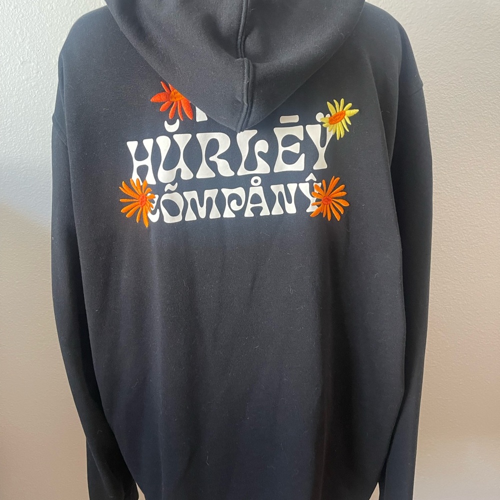 Hurley Black Zip-Up Hoodie with Orange & Yellow Floral Logo